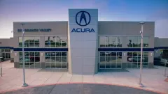 front of car dealership Acura of Rio Grande