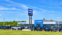 The outside of a blue Gregg Young Chevrolet dealership.