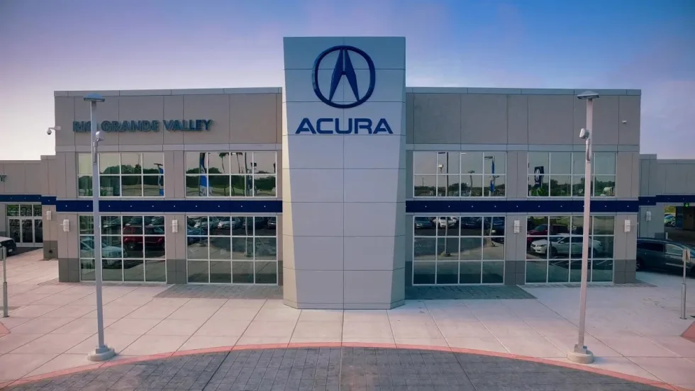 front of car dealership Acura of Rio Grande