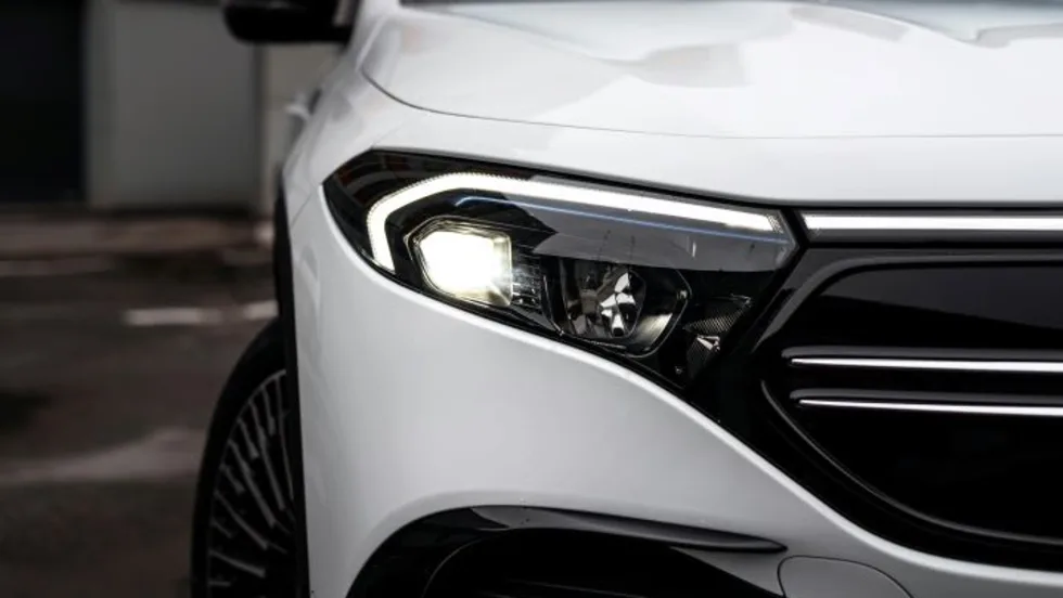 Closeup photo of the front of a white car