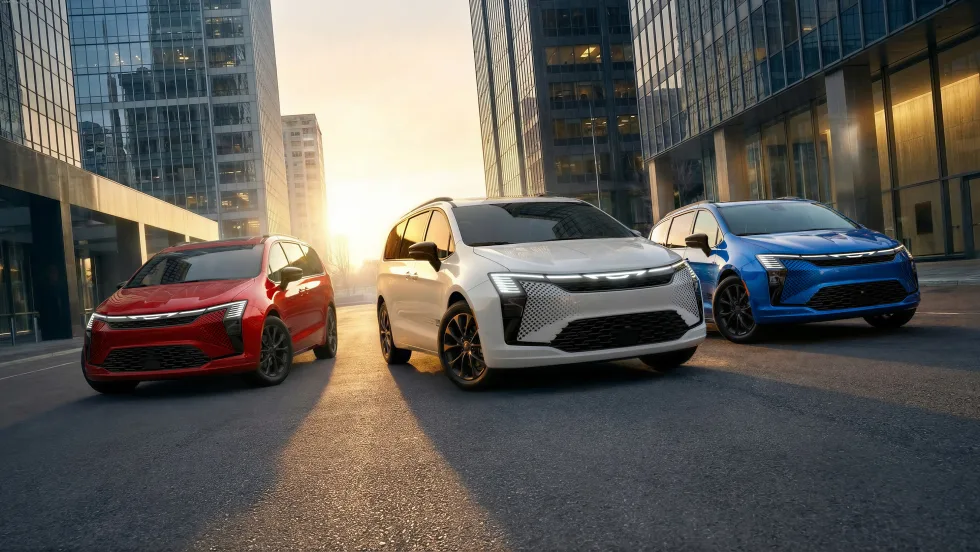 Photo of three Chrysler Pacifica minivans, one each red, white and blue