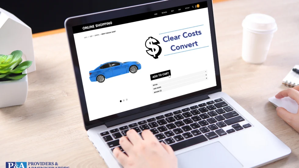laptop with blue car on screen on a shopping website, Clear Costs Convert