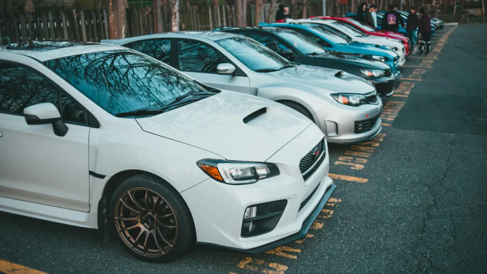 Photo of cars lined up on lot