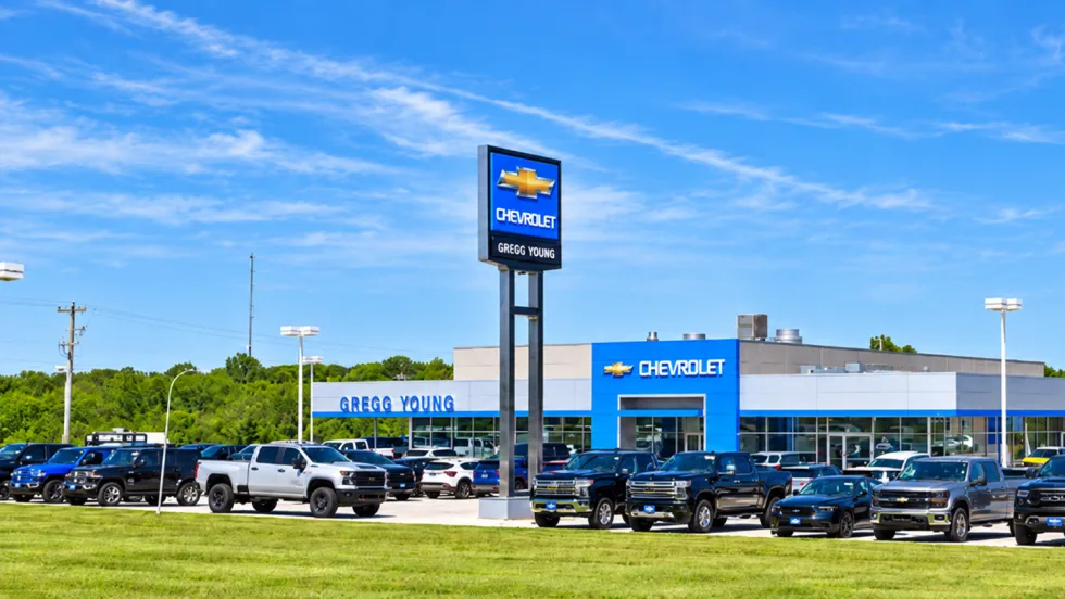 The outside of a blue Gregg Young Chevrolet dealership.