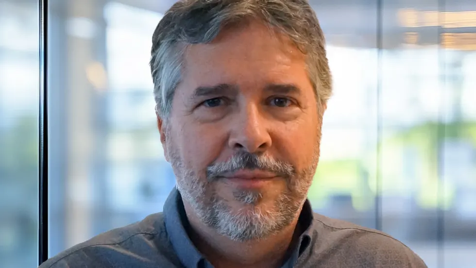 Man smiling at camera.