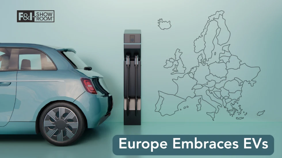 Map of Europe next to back of EV car.