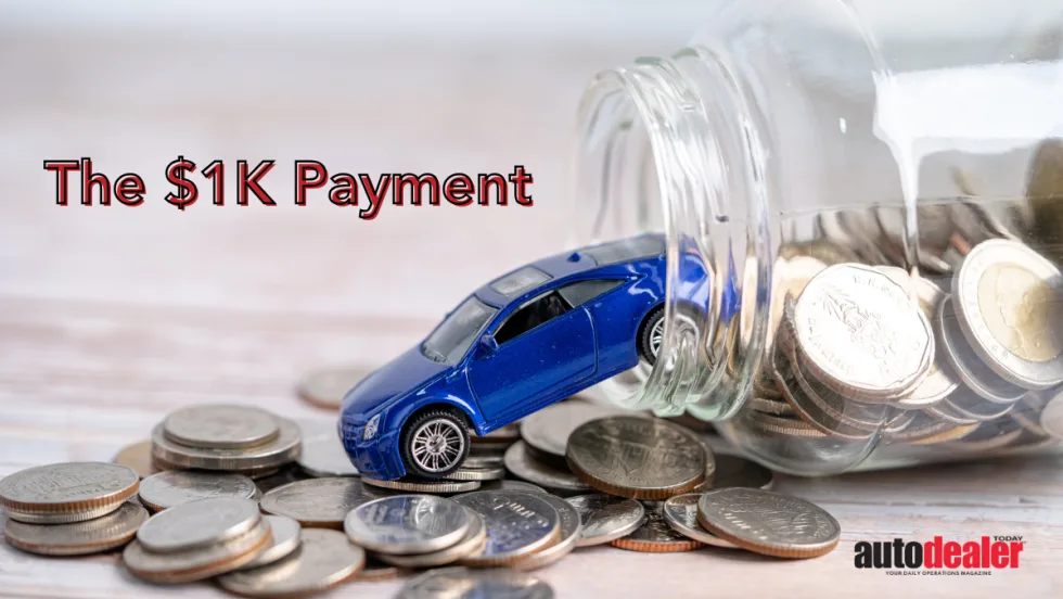 Tiny toy car falling out of jar of coins. “The $1K Payment”