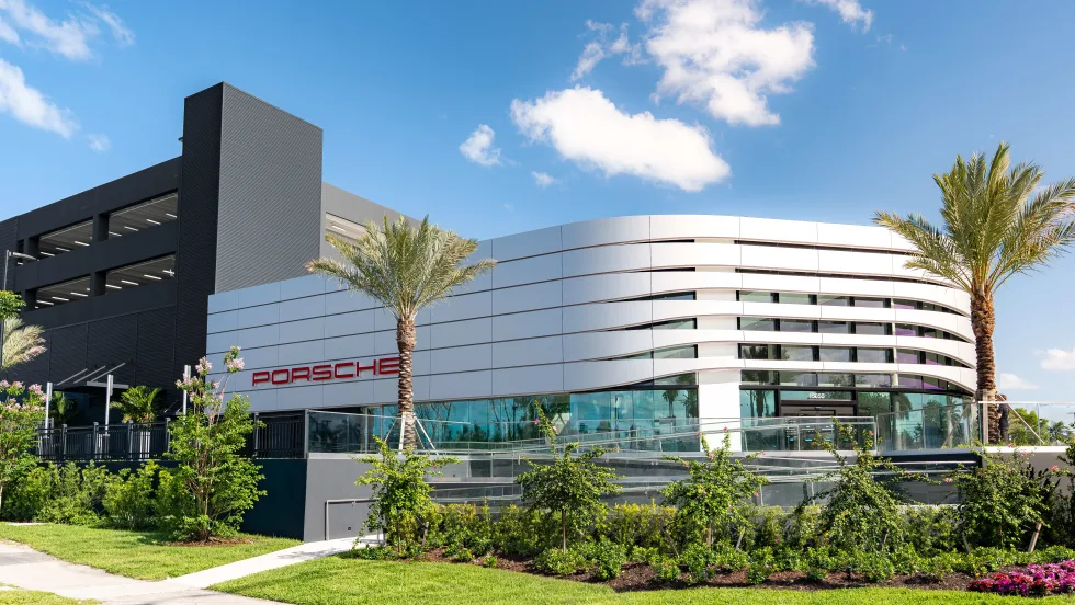exterior daytime image of Porsche North Miami dealership