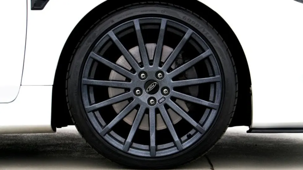 Photo of tire on white car