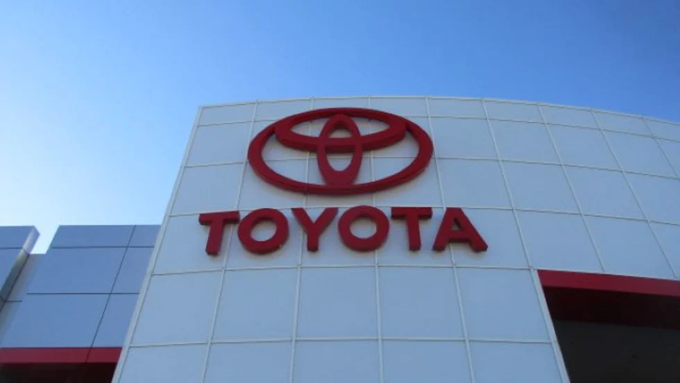 Photo of dealership sign with Toyota logo