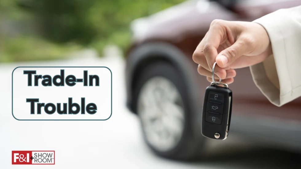 silver car in background with hand in front holding out a set of keys, Trade-In Trouble, F&I and Showroom