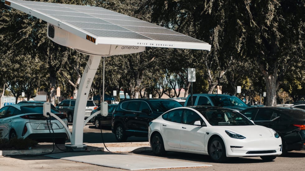 electric vehicles charging at a station