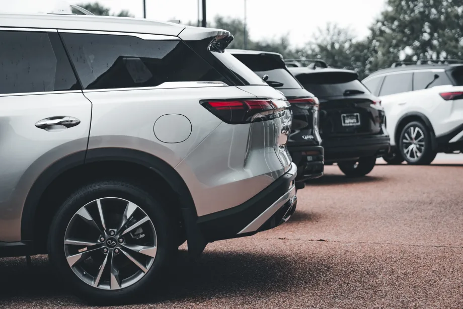 Photo of multiple new SUVs on a car dealership lot