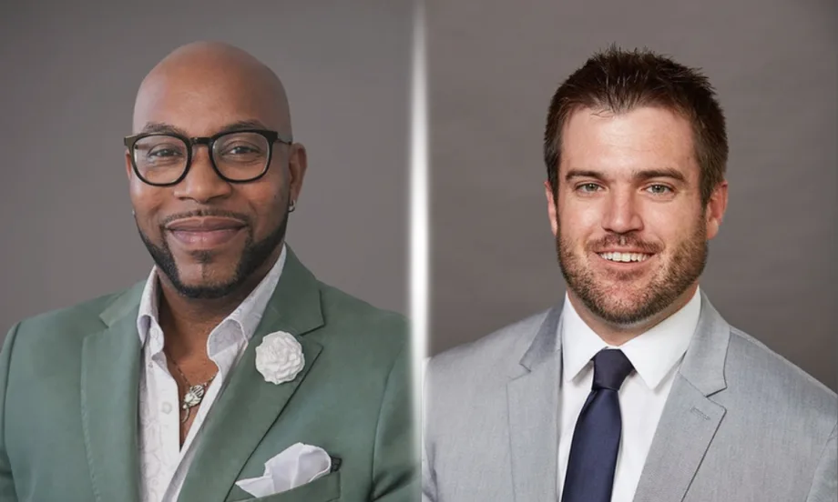 on the left black man in suit and glasses, on the right white man in suit