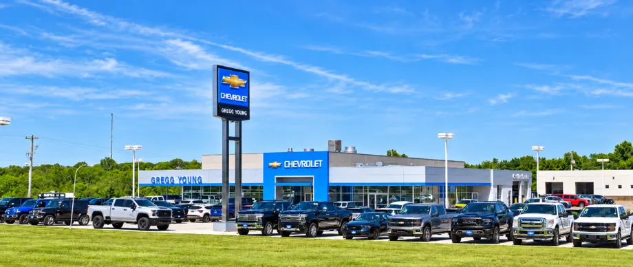 The outside of a blue Gregg Young Chevrolet dealership.