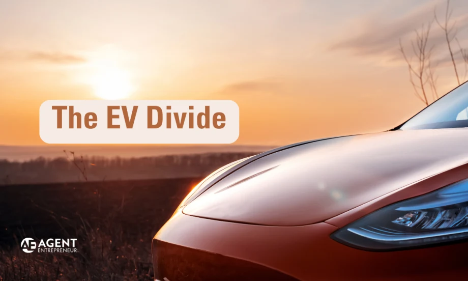 Hood of orange Tesla in front of sunrise