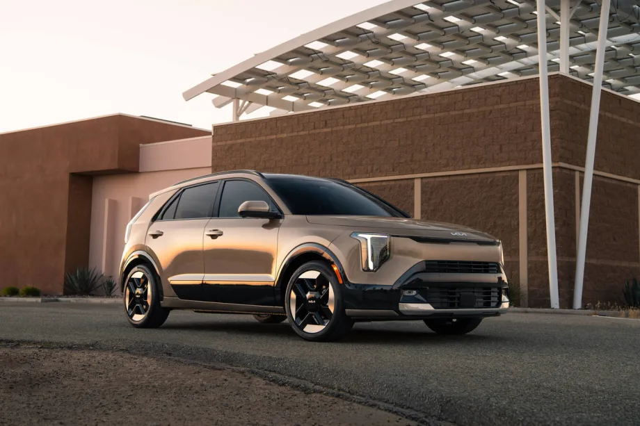 Kia Niro SUV in gold color parked outdoors