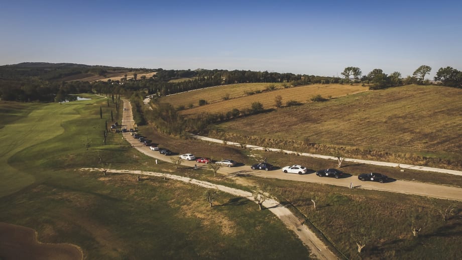 roadway with Maserati vehicles