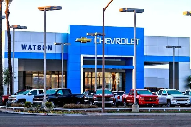 Facade of Chevrolet dealership sold in two-store transaction