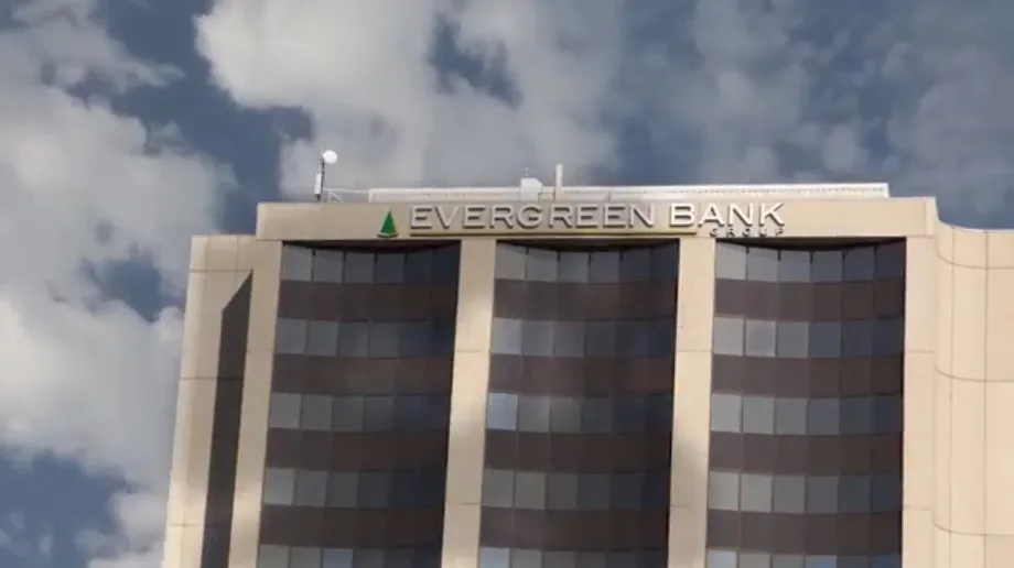 Evergreen Bank Moves to Flat Fees Due to Regulatory Pressures