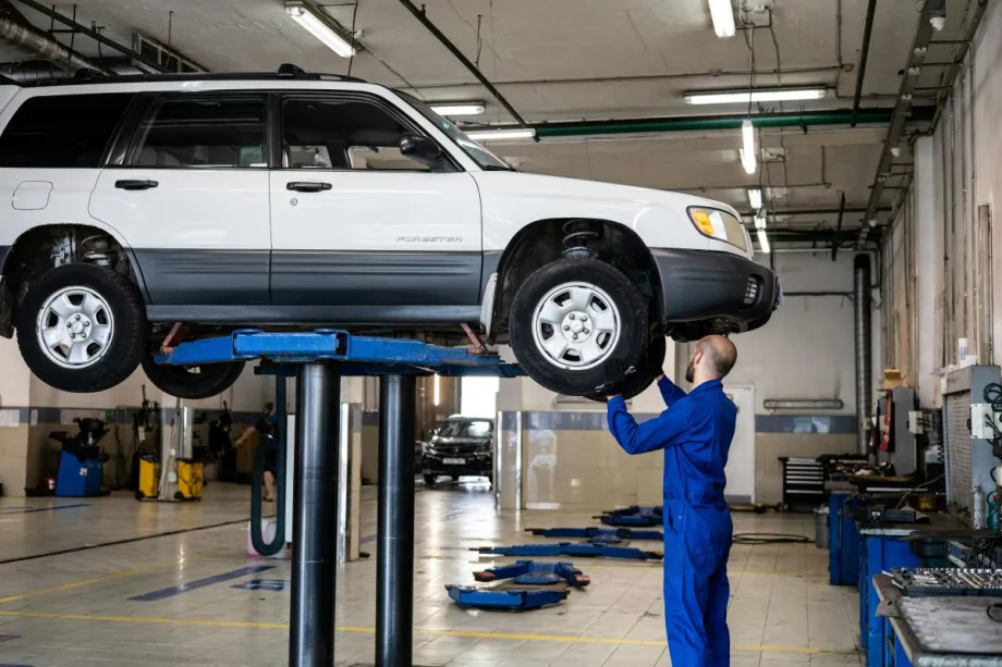 mechanic working on a vehicle