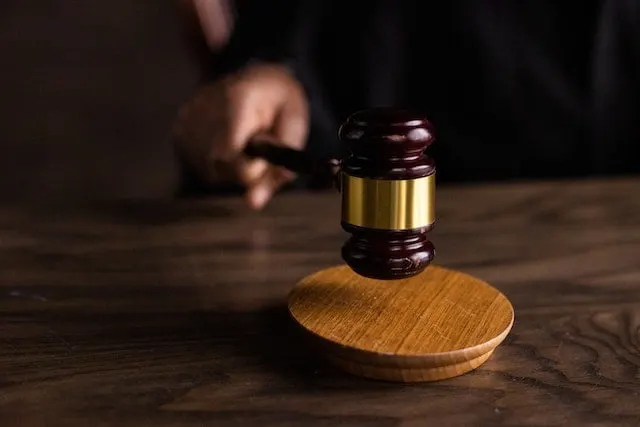 Ex-Dealer Pleads Guilty to Tampering Charges