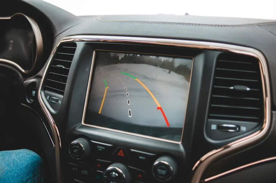 interior car dashboard, infotainment system, showing rearview backup camera